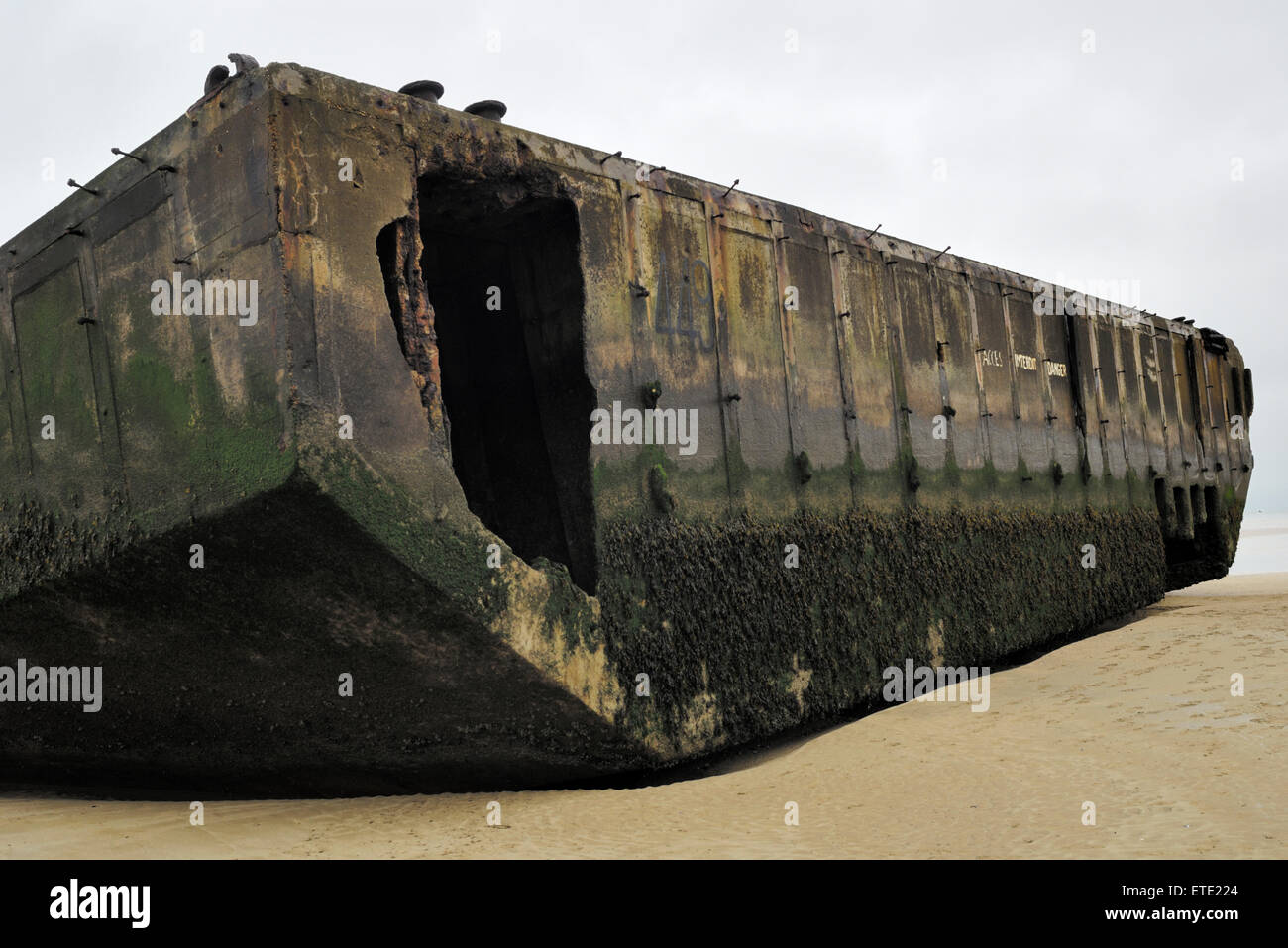 Remains of World War 2 Mulberry temporary harbour at Arromanches, France Stock Photo
