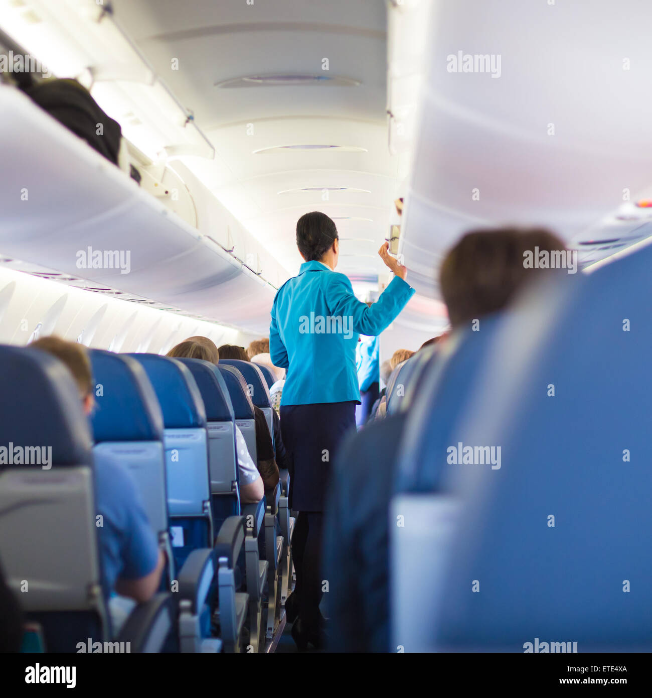 Air hostess airplane interior hi-res stock photography and images - Alamy