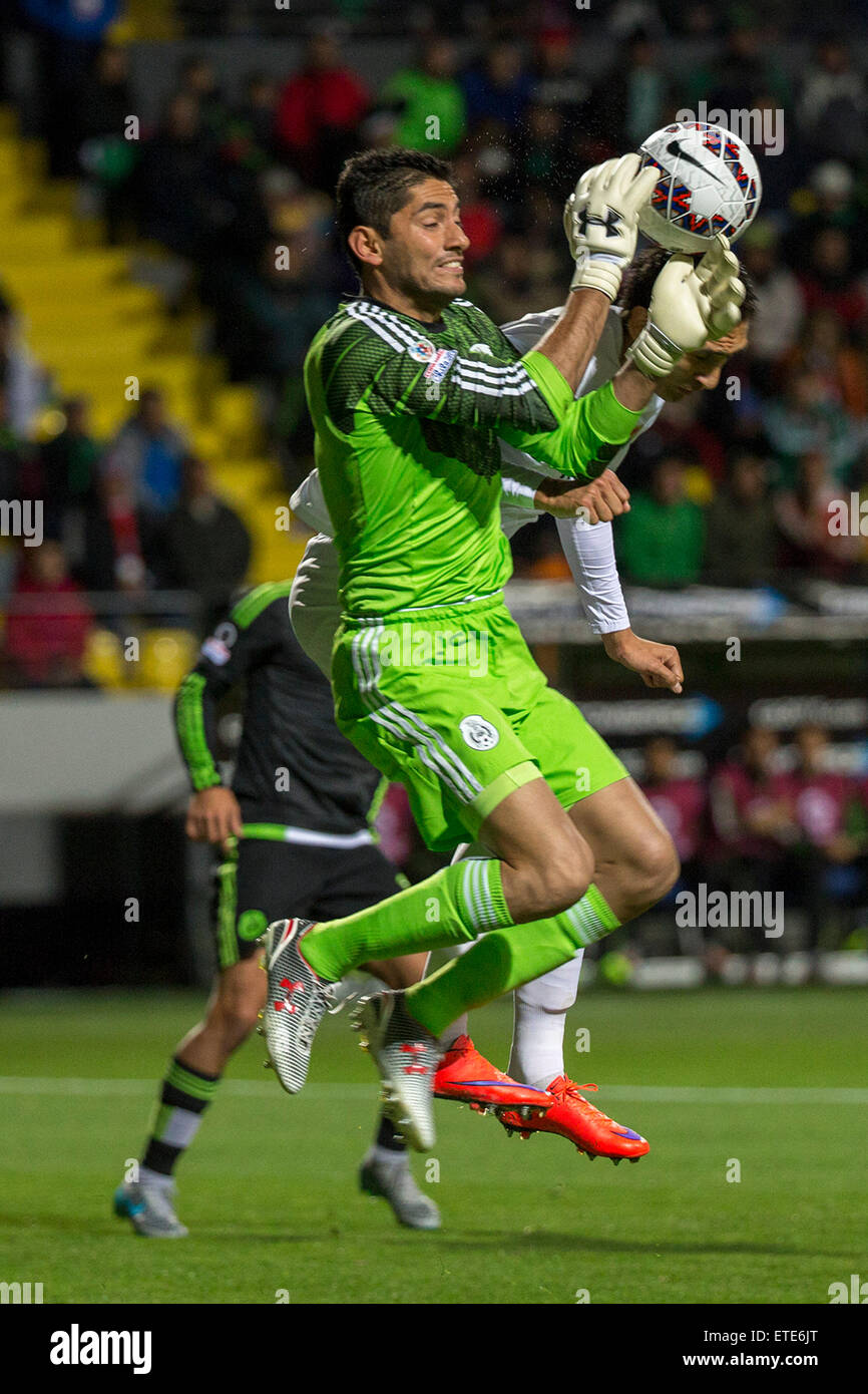 Vina Del Mar, Chile. 12th June, 2015. Mexico's goalkeeper Jesus Corona saves the shot during the Group Phase match of the Copa America 2015 against Bolivia, in the El Sausalito stadium, in Vina del Mar, Chile, on June 12, 2015. Credit:  Luis Echeverria/Xinhua/Alamy Live News Stock Photo
