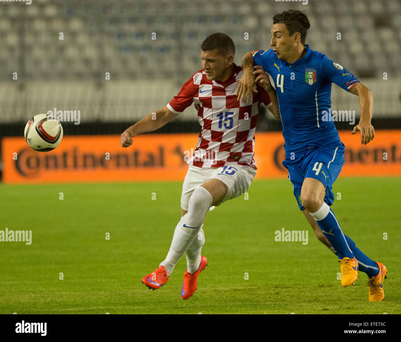 Split, Croatia. 12th June, 2015. Ante Rebic of Croatia (L) vies with Matteo  Darmian of Italy during Euro 2016 Group H qualifying soccer match at Poljud  stadium in Split, Croatia, June 12,