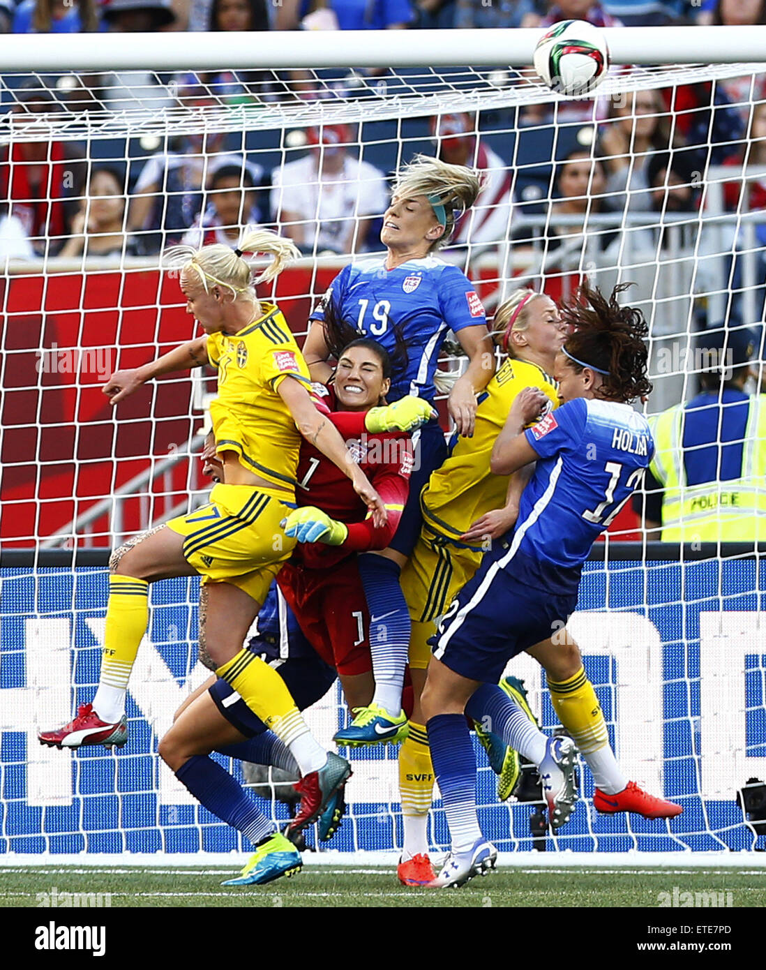 Winnipeg, Canada. 12th June, 2015. Hope Solo (2nd L), goalkeeper of the United States, saves the ball during their Group D match against Sweden at Winnipeg Stadium in Winnipeg, Canada on June 12, 2015. (Xinhua/Ding Xu) Credit:  Xinhua/Alamy Live News Stock Photo