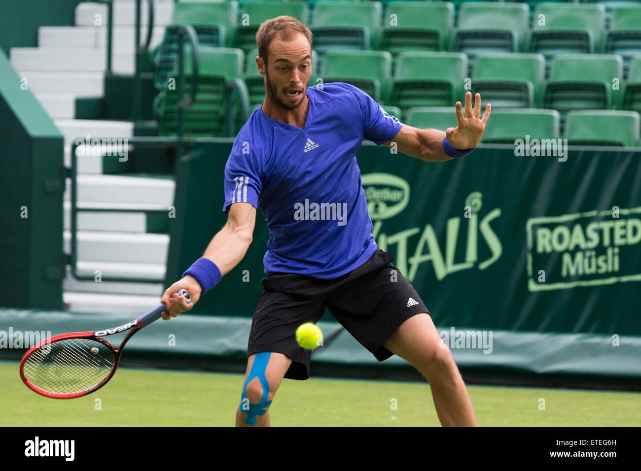Tim Puetz (DE) returns a shot in the qualifying rounds of the ATP Gerry Weber Open Tennis Championships at Halle, Germany. Stock Photo