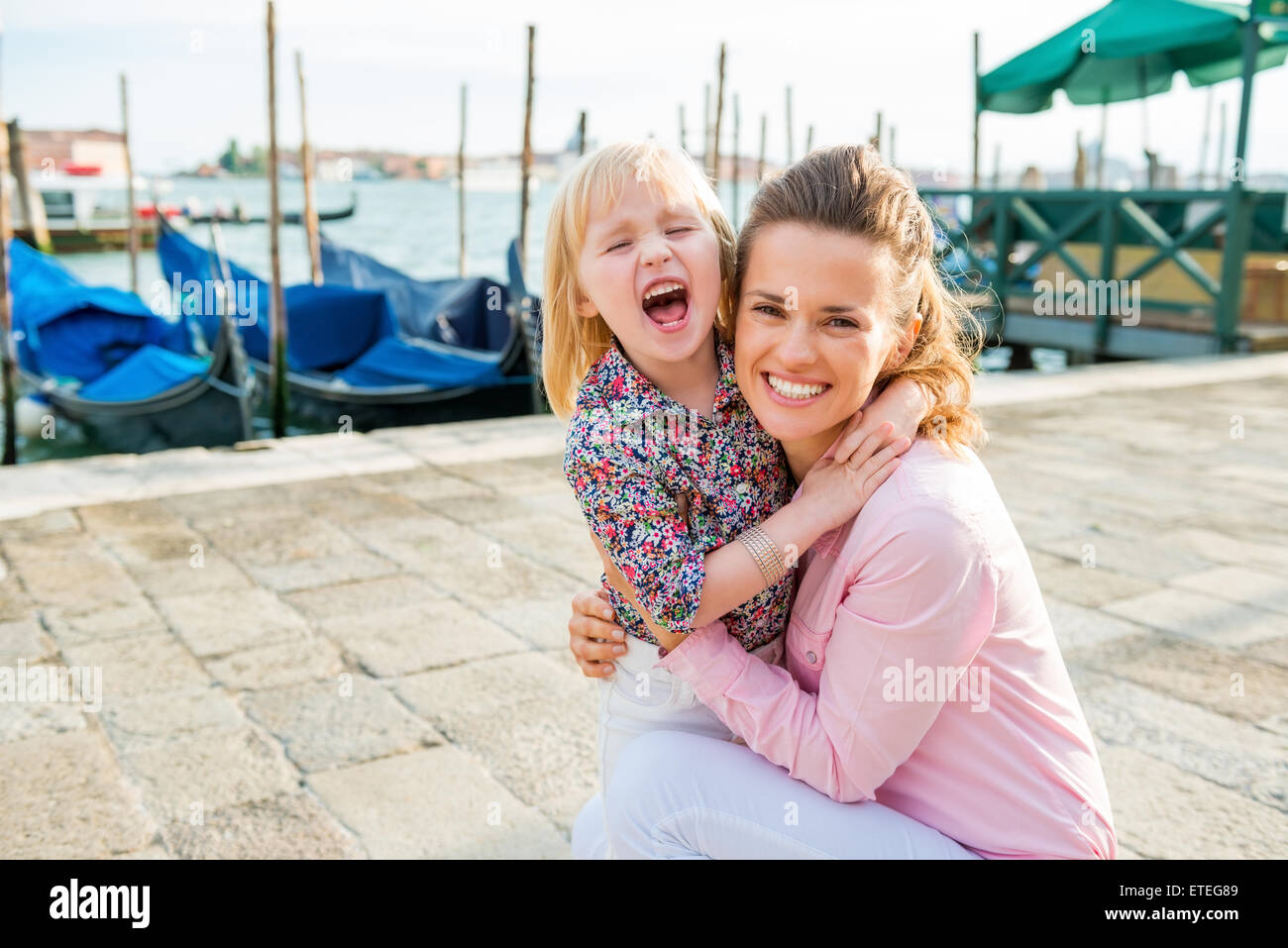 A little bit of the giggles is the magic ingredient for making touring fun with a child! Stock Photo