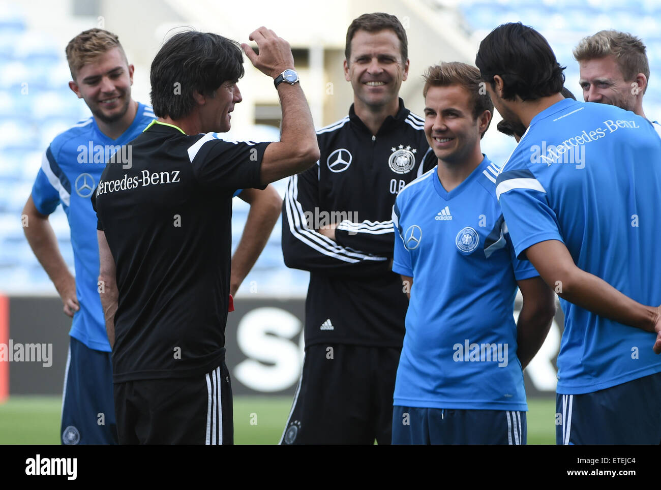 Faro, Portugal. 12th June, 2015. German head coach Joachim Loew (2nd left) talks to Christoph Kramer (l-r), Oliver Bierhoff, Mario Goetze, Sami Khedira and Andre Schuerrle during a training session at the Algarve Stadium of Faro, Portugal, 12 June 2015. Germany will face Gibraltar in the European qualifiers in Faro on 13 June 2015. Photo: Arne Dedert/dpa/Alamy Live News Stock Photo