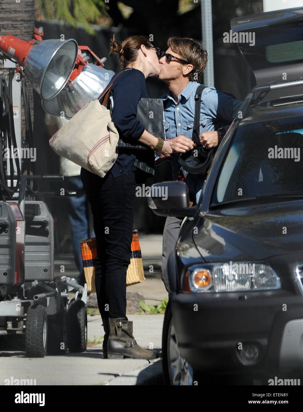 Actress Julia Roberts Gives Her Husband Danny Moder A Kiss Goodbye Before Going To The Set Of The Secret In Their Eyes Filming In Downtown Los Angeles Danny Moder Seen Skateboarding Off