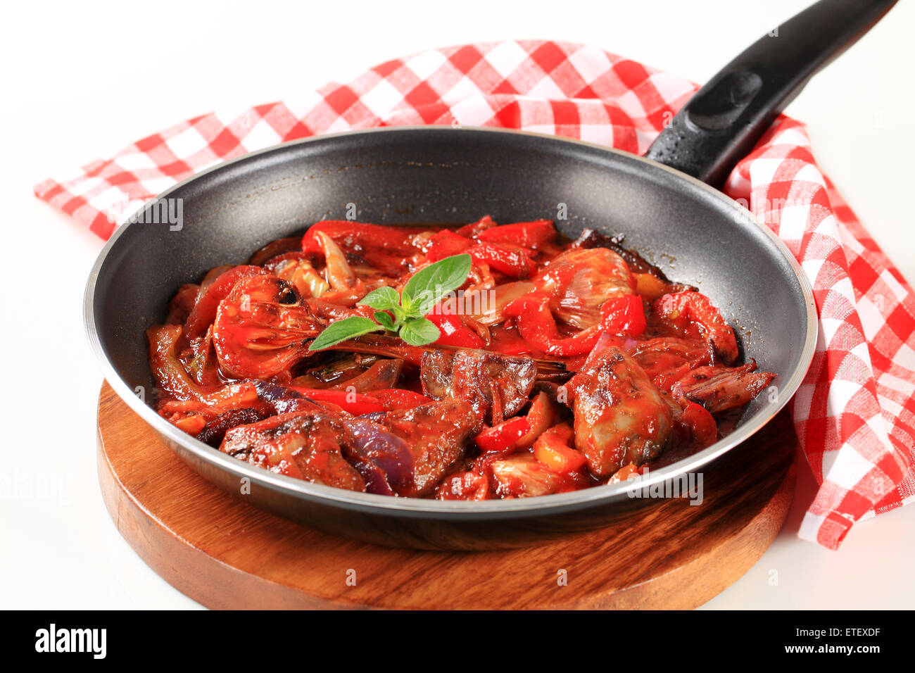 Preparing chicken liver stir fry Stock Photo Alamy