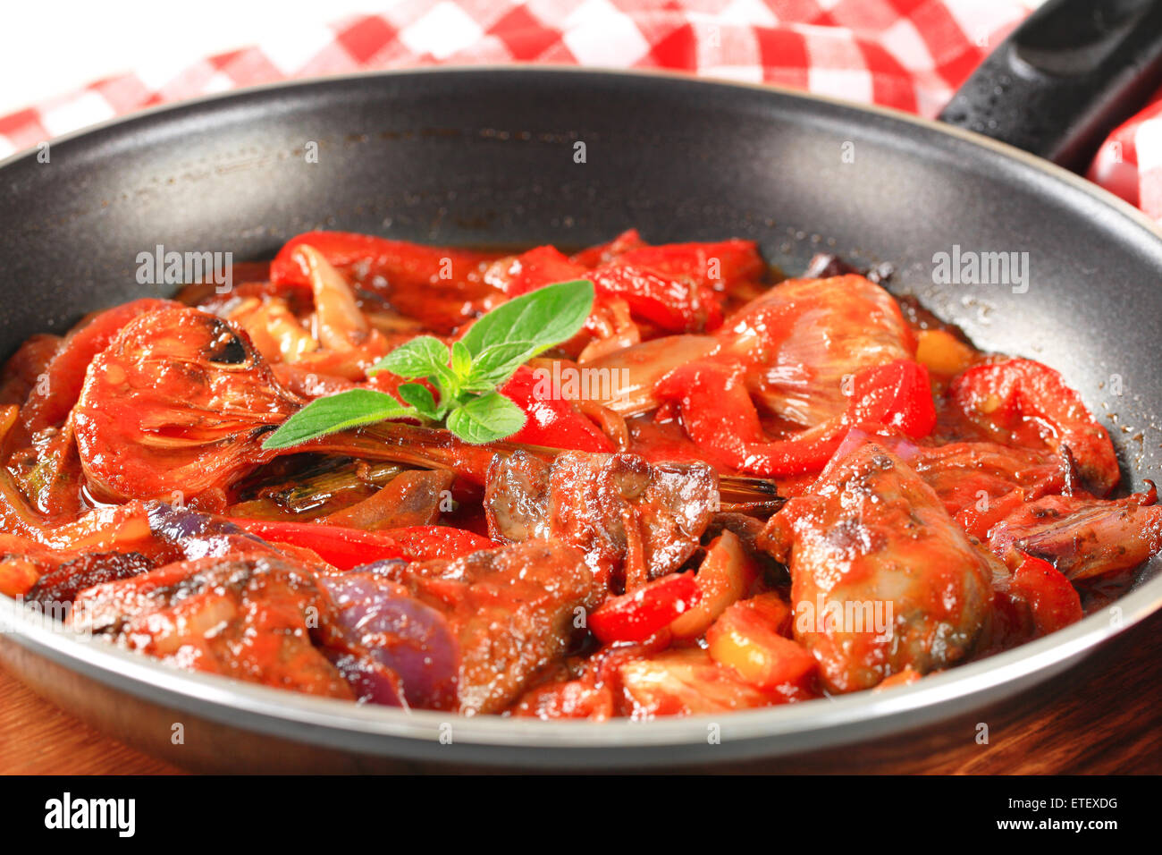 Preparing chicken liver stir fry Stock Photo Alamy