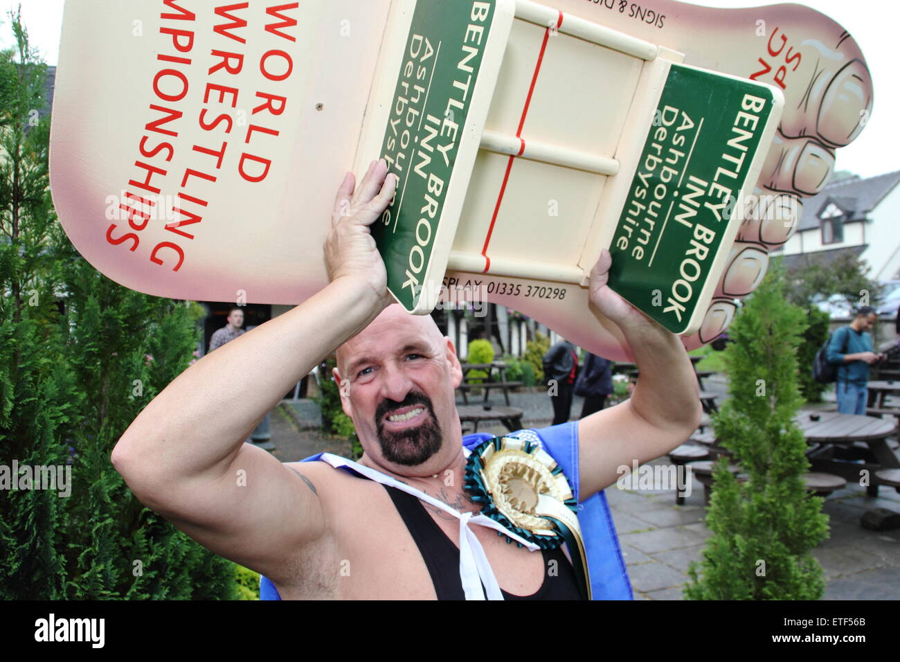 Ashbourne, Derbyshire, UK. 13 June 2015. Veteran toe-wrestling competitor Alan ‘Nasty’ Nash retained his World Champion title at the Bentley Brook Inn in Fenny Bentley Credit:  Matthew Taylor/Alamy Live News Stock Photo