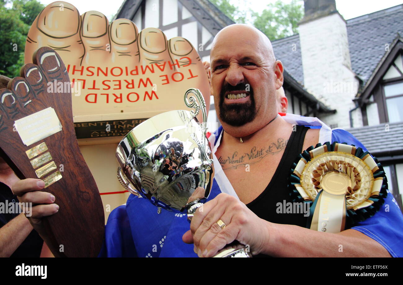 Ashbourne, Derbyshire, UK. 13 June 2015. Veteran toe-wrestling competitor Alan ‘Nasty’ Nash retained his World Champion title at the Bentley Brook Inn in Fenny Bentley Credit:  Matthew Taylor/Alamy Live News Stock Photo