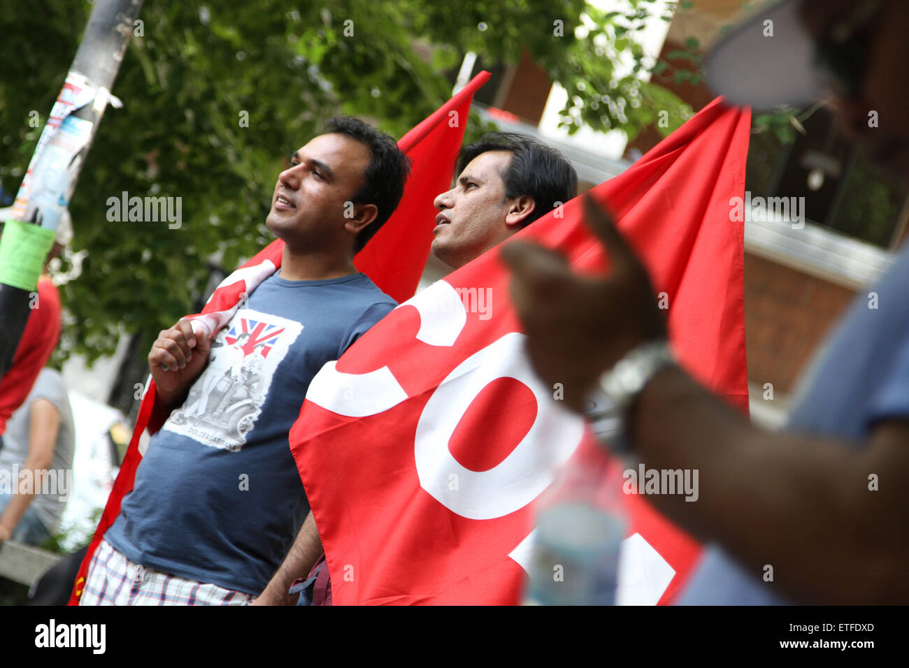 Bologna, Italy. 13th June, 2015. A demonstrators with flags looks during the protest of migrants against racism and exploitation - Freedom, not borders - on Saturday 13 Junel 2015, in Bologna. Credit:  Andrea Spinelli/Alamy Live News Stock Photo