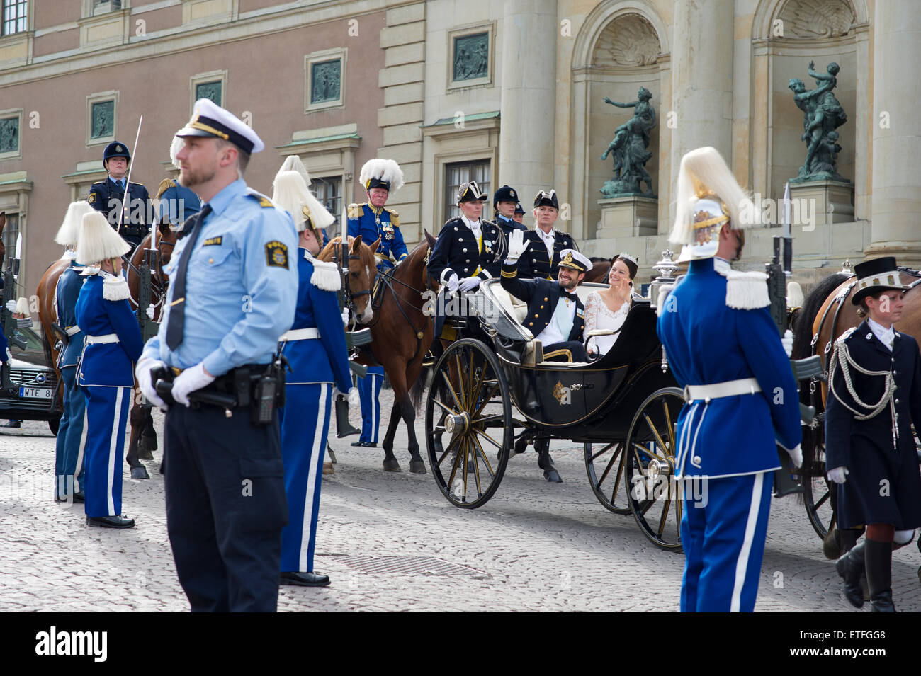 Stockholm, Sweden, June 13, 2015. The wedding of HRH Prince Carl Philip and Princess Sofia, Sweden. HRH Prince Carl Philip and Princess Sofia are leaving the Royal chapel by carriage. The cortege goes through Stockholm. Credit:  Barbro Bergfeldt/Alamy Live News Stock Photo