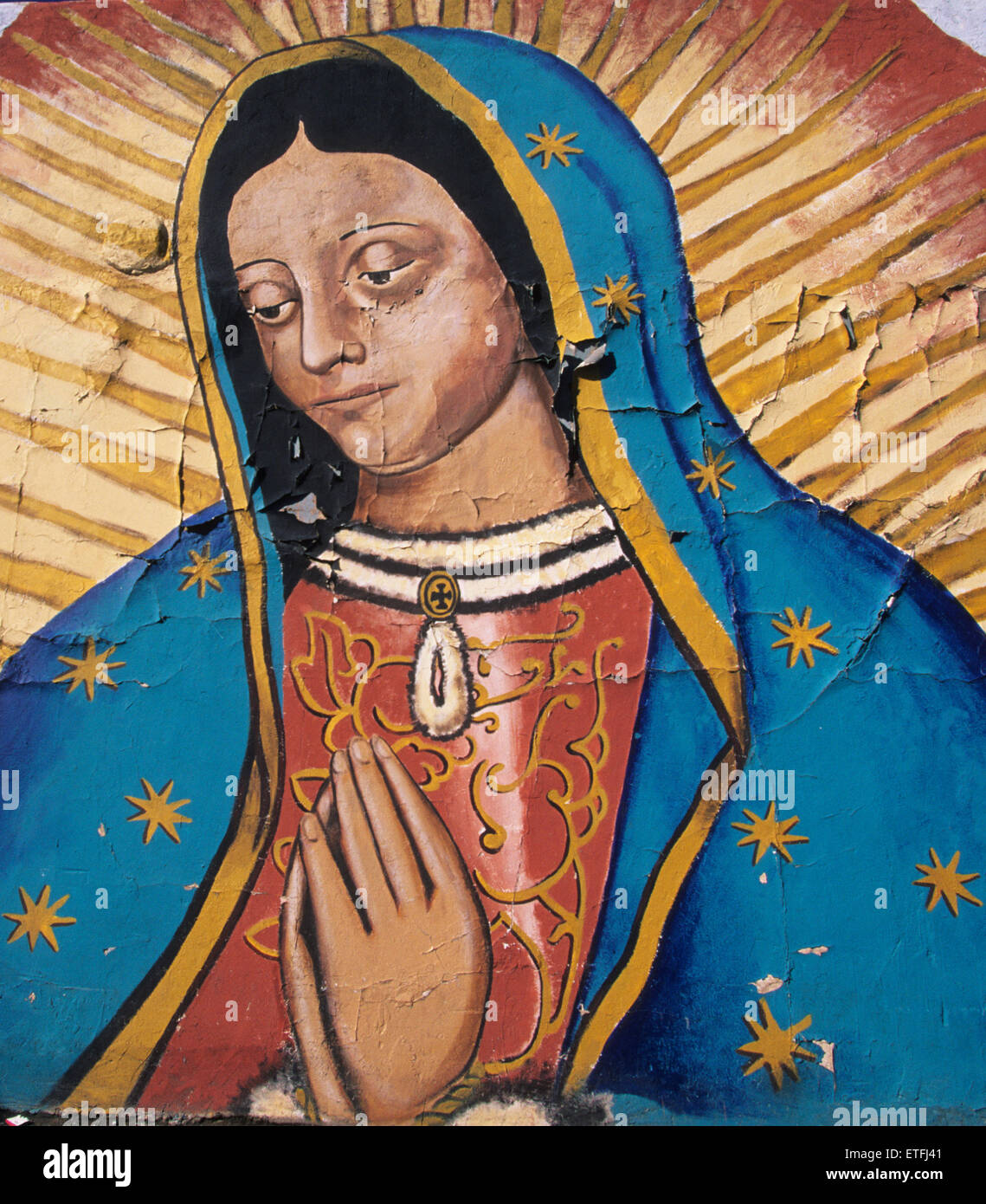 the-peeling-paint-and-drowsy-eyes-of-this-mural-of-the-virgin-of