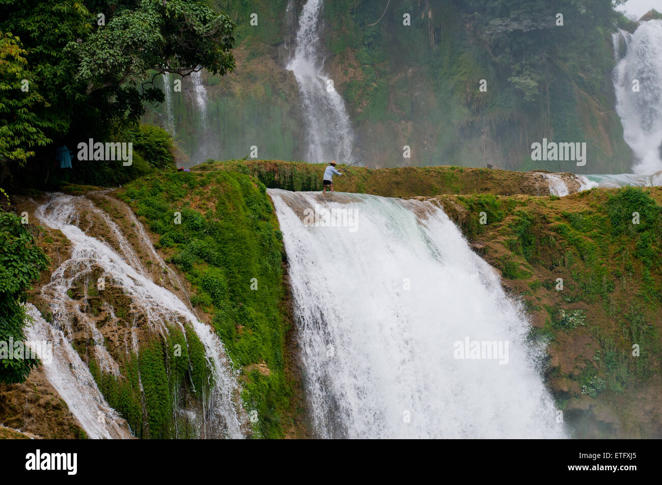 Fishing on Bangioc waterfall in Caobang, Vietnam Stock Photo