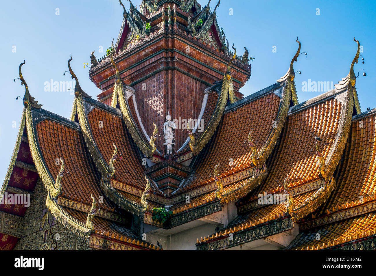 Asia. Thailand, Chiang Mai. Wat Bupparam. Detail of a typical pagode roof. Stock Photo