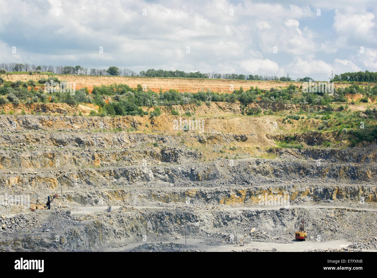 A quarry - an open-pit mining for rocks in Ukraine. Stock Photo