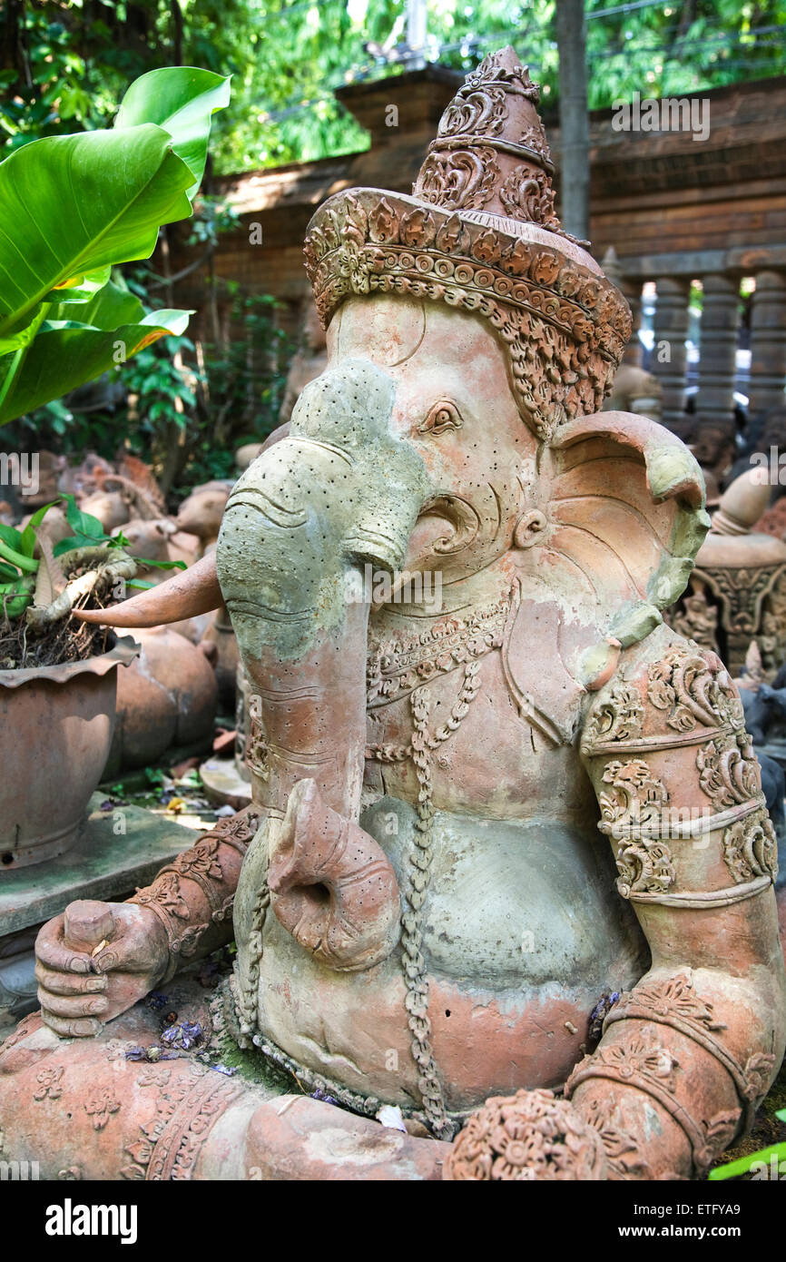 An image of the Hindu elephant deity Ganesha presides over his spot in