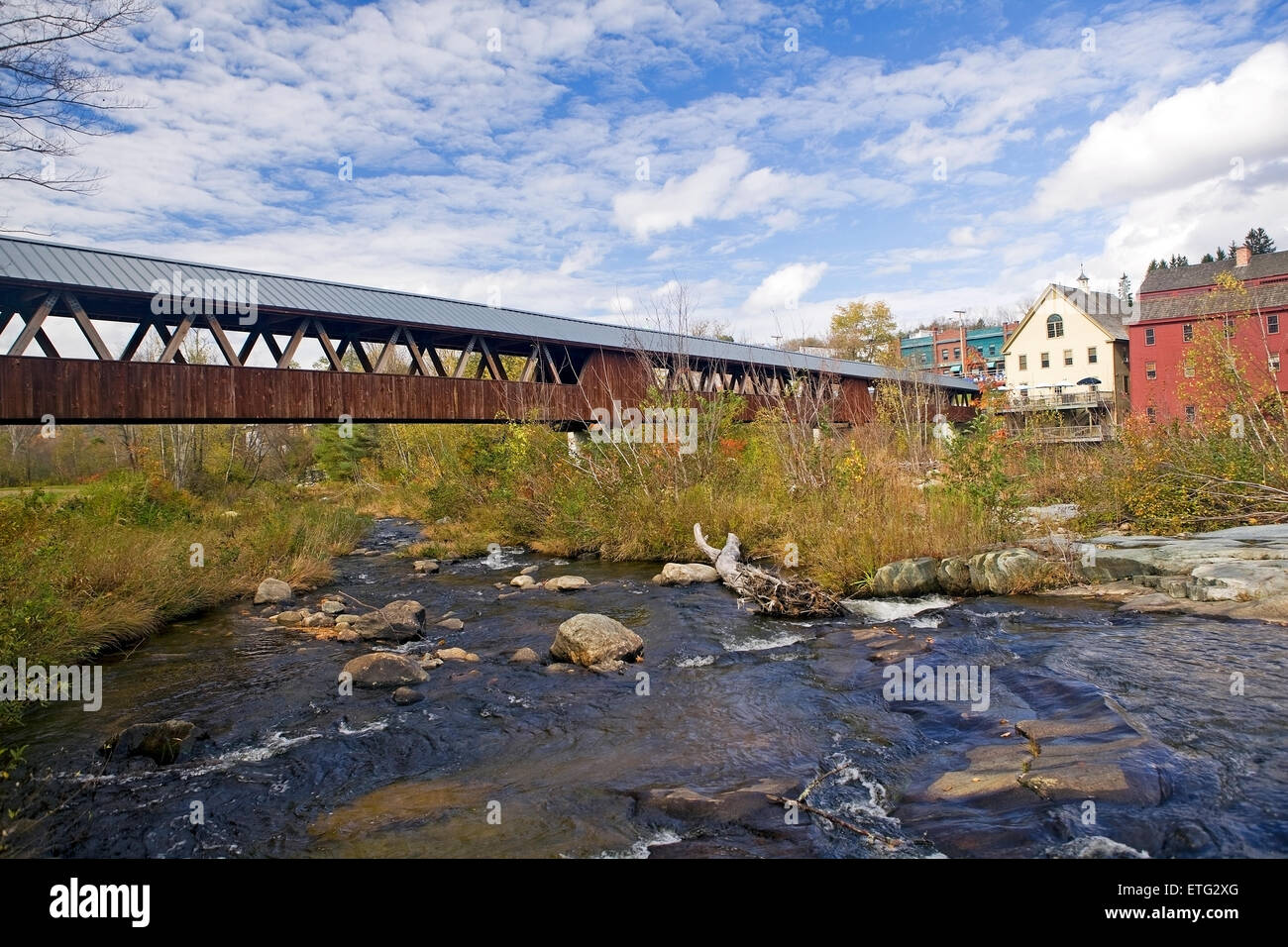 The Riverwalk Covered Bridge spans the Ammonoosuc River in rural