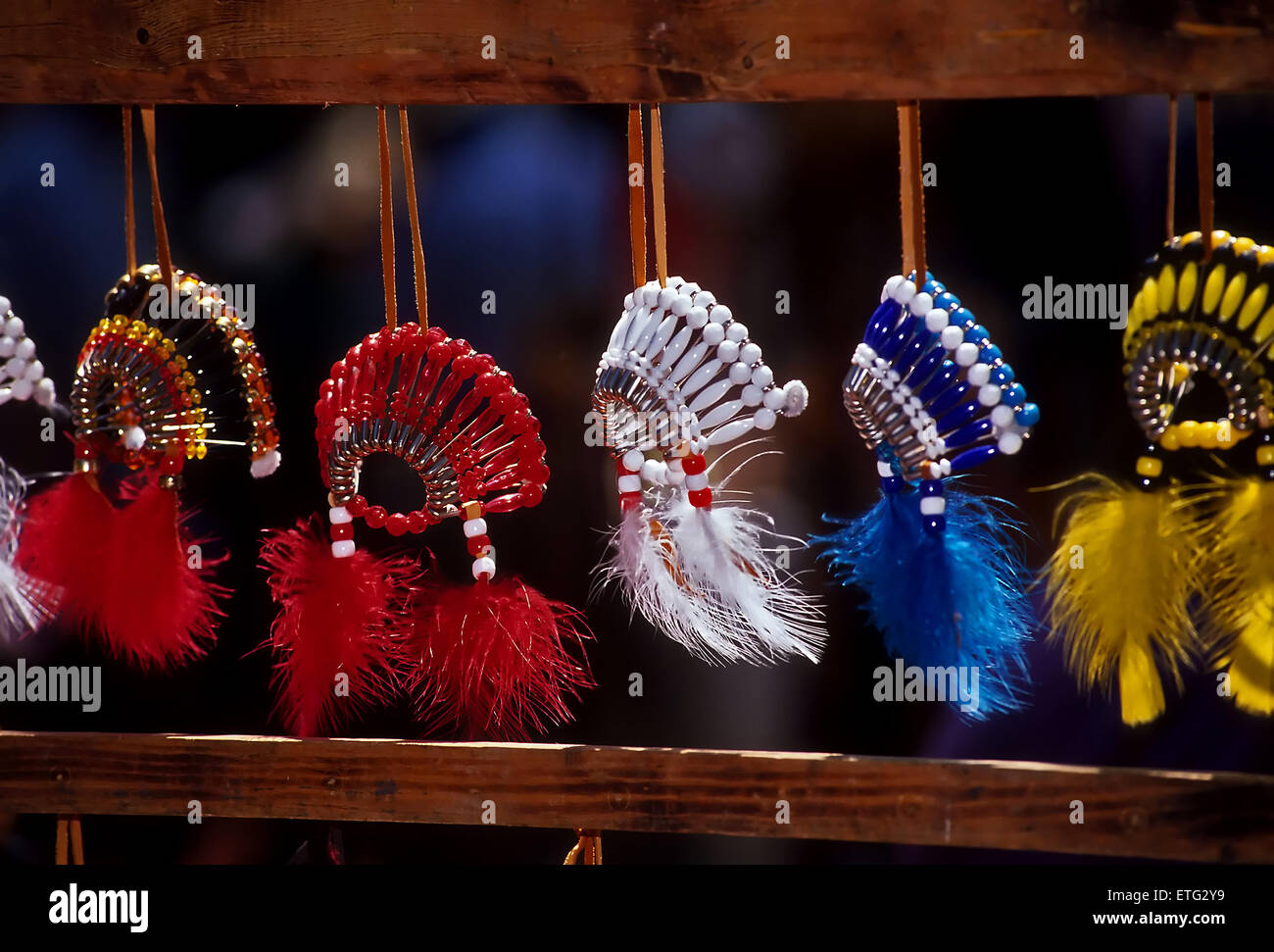 Miniature souvenir headdresses, war bonnets, for sale at the annual Dartmouth College Native American Powwow. Stock Photo