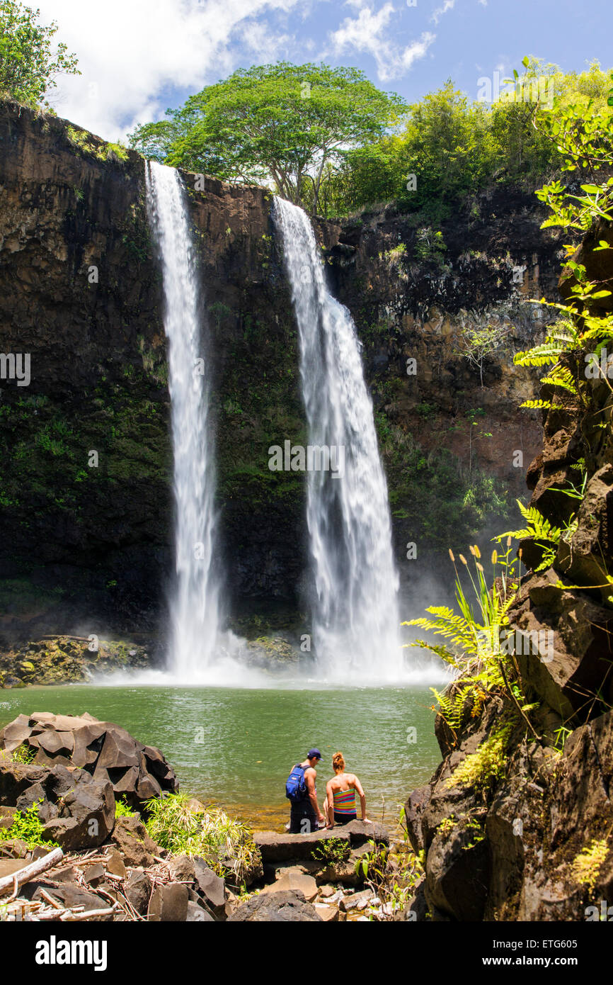 Tourists at Wailua Falls, Kauai, Hawaii, USA Stock Photo