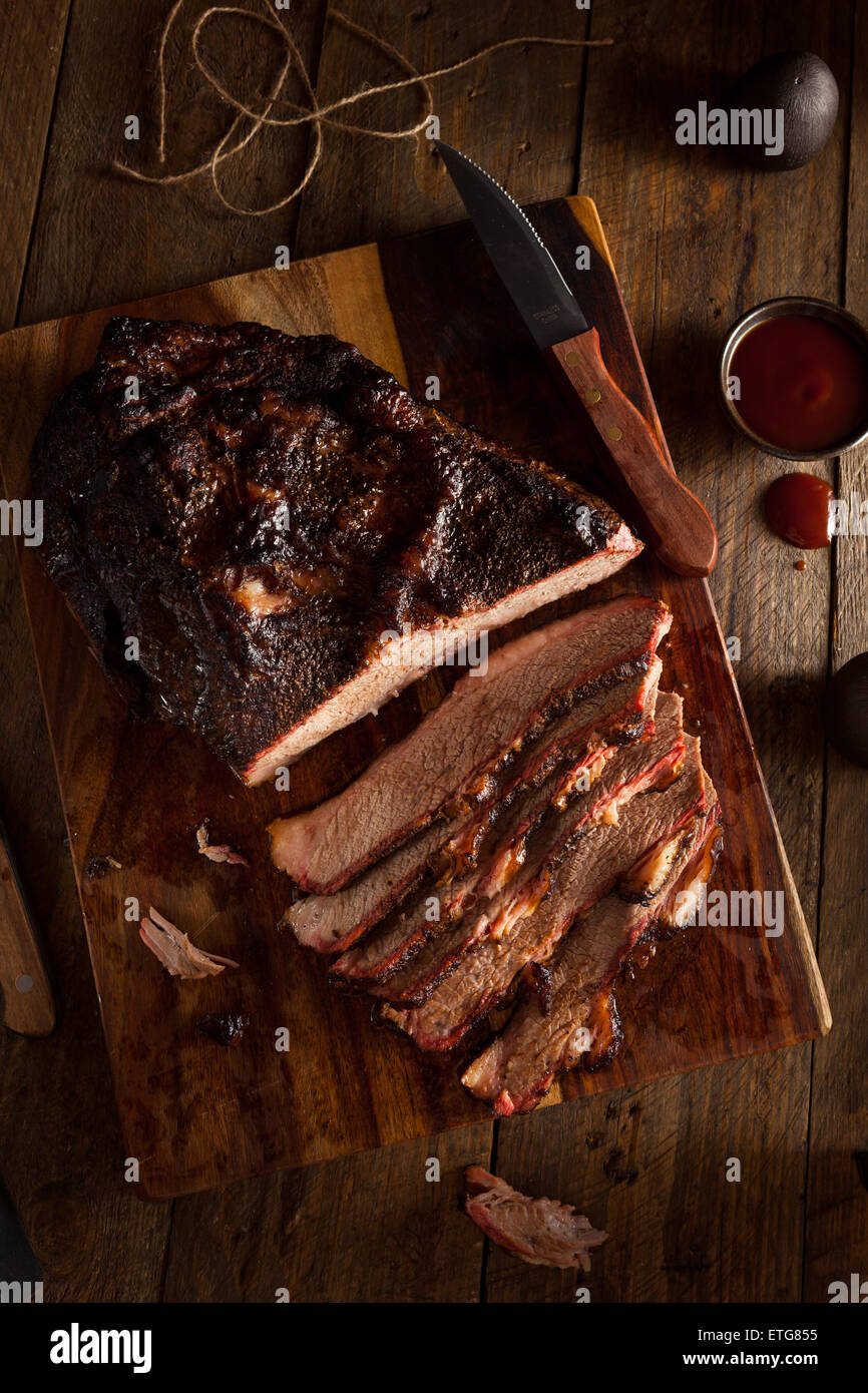 Homemade Smoked Barbecue Beef Brisket with Sauce Stock Photo