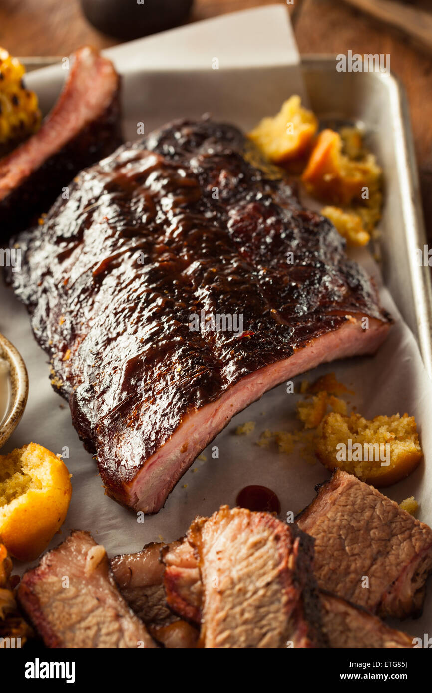 Barbecue Smoked Brisket and Ribs Platter with Pulled Pork and Sides