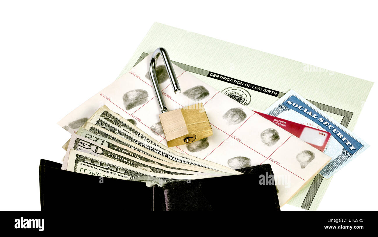 Fingerprint card, driver's license, social security card and birth certificate isolated on white with wallet exposing currency a Stock Photo