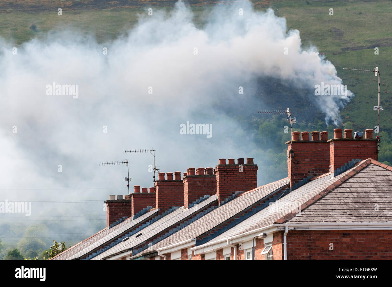 Belfast, Northern Ireland. 13th June, 2015. Large fire on Divis Mountain covers West Belfast in dense smoke. Credit:  Stephen Barnes/Alamy Live News Stock Photo