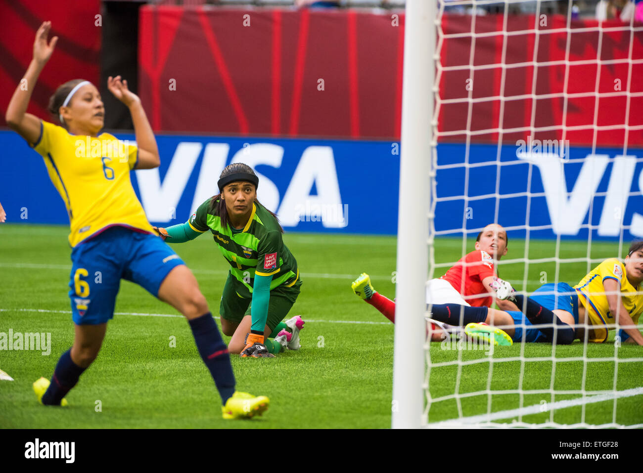 Vancouver, Canada - June 12, 2015: Ecuador goalkeeper Shirley BERRUZ (#1) look on as a Switzerland goal is scored during the opening round match between Switzerland and Ecuador of the FIFA Women's World Cup Canada 2015 at BC Place Stadium. Switzerland won the match 10-1. Stock Photo