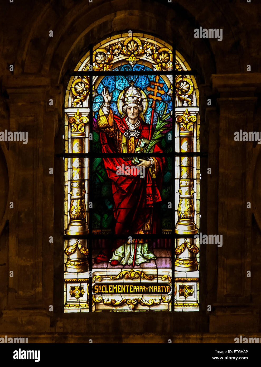 Stained glass window depicting Pope Clement I, bishop of Rome from 92 to 99, martyr and patron saint of mariners Stock Photo