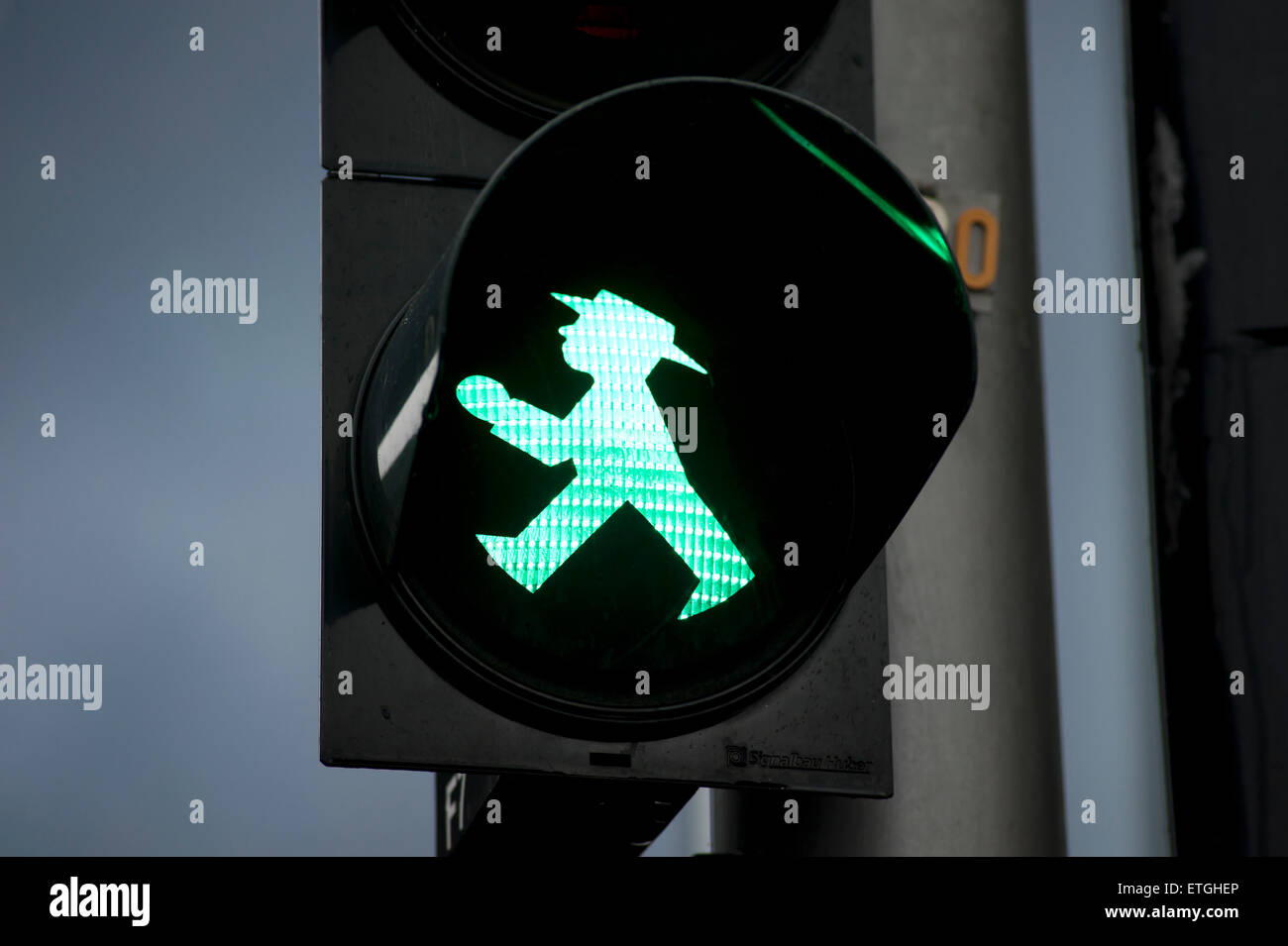 East German Ampelmaennchen, green traffic light for pedestrians for go, relic of former GDR times in East Berlin Germany Europe Stock Photo