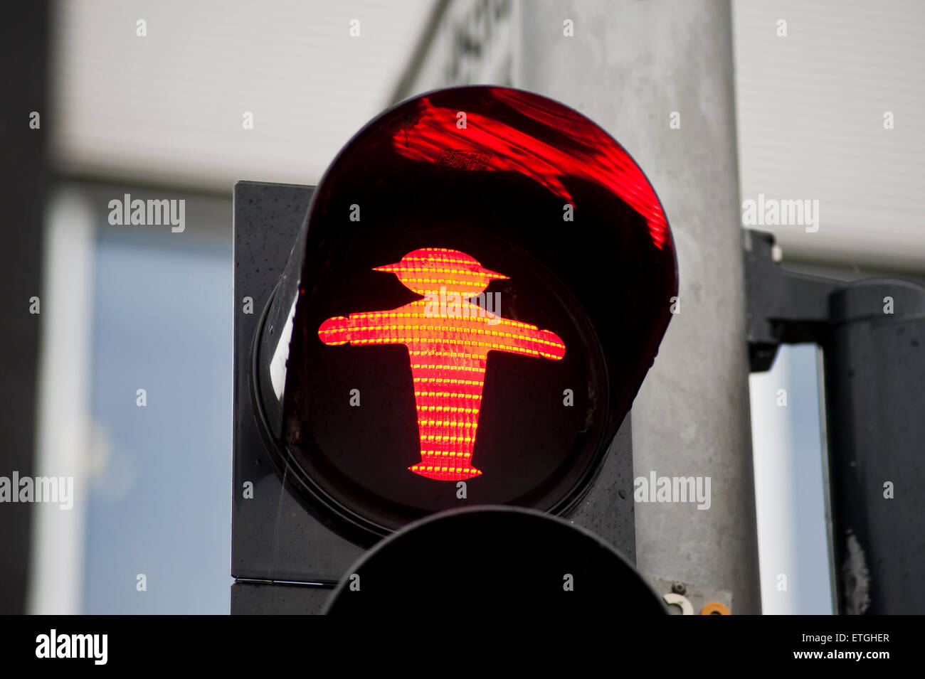 East German Ampelmaennchen, red traffic light for pedestrians to stop, relic of former GDR times in East Berlin Germany Europe Stock Photo