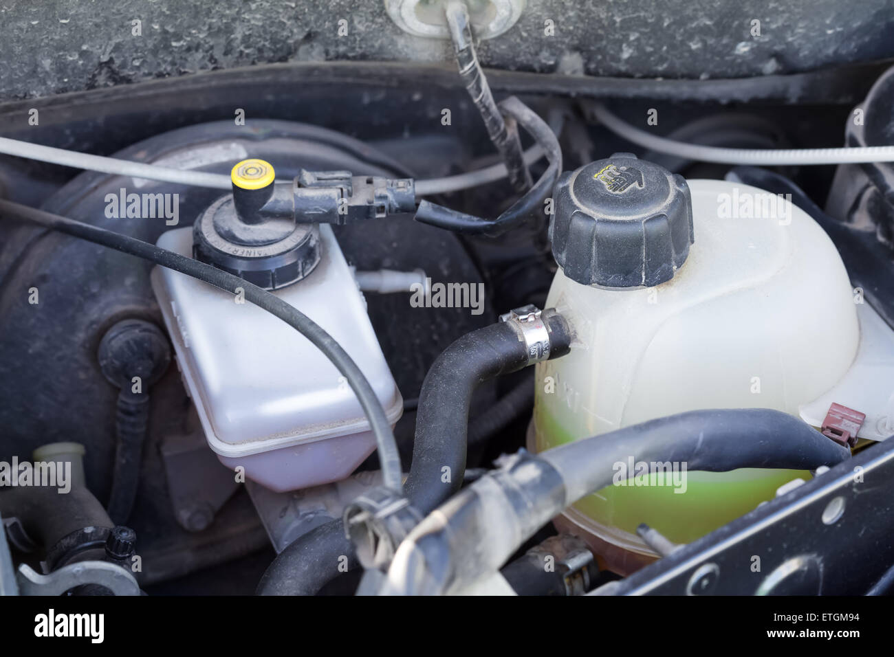 Closeup parts of  car engine. Checking antifreeze Stock Photo