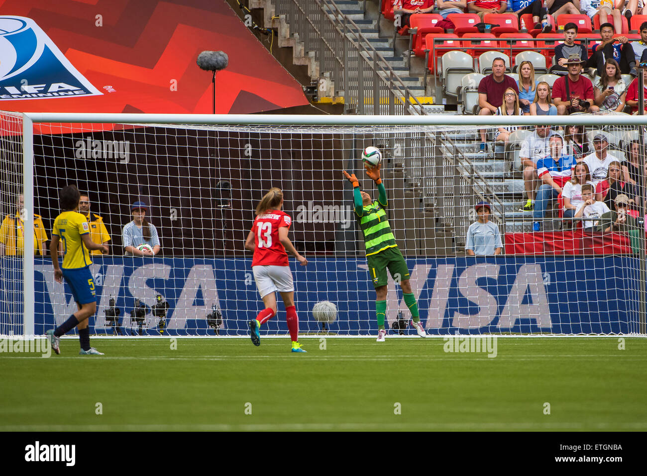 Vancouver, Canada - June 12, 2015: Ecuador goalkeeper Shirley BERRUZ (#1) blocks a Switzerland shot, only to have it fall into the net shortly afterward, during the opening round match between Switzerland and Ecuador of the FIFA Women's World Cup Canada 2015 at BC Place Stadium. Switzerland won the match 10-1. Stock Photo