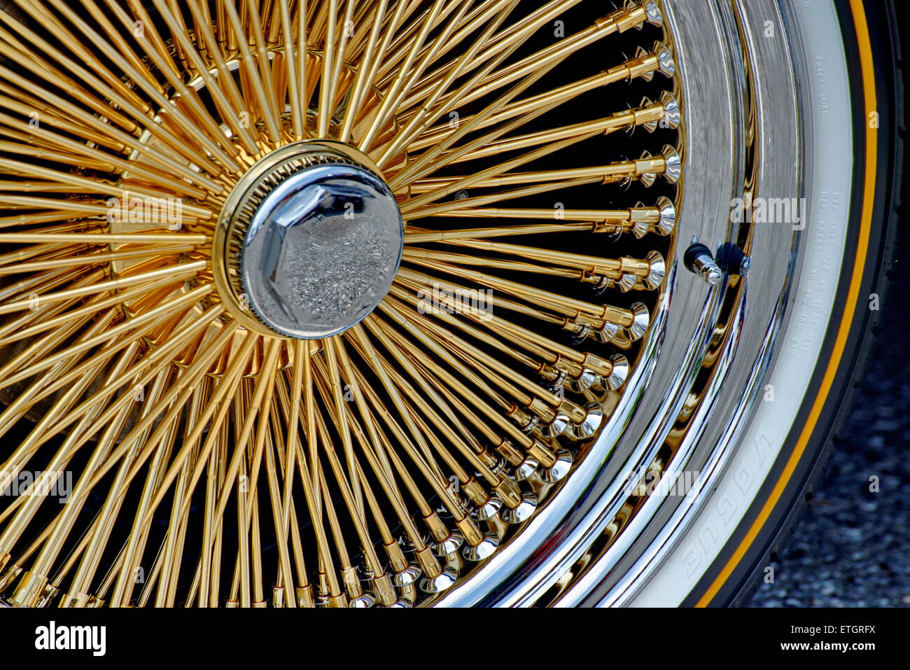 Gold plated wheel spokes Stock Photo Alamy