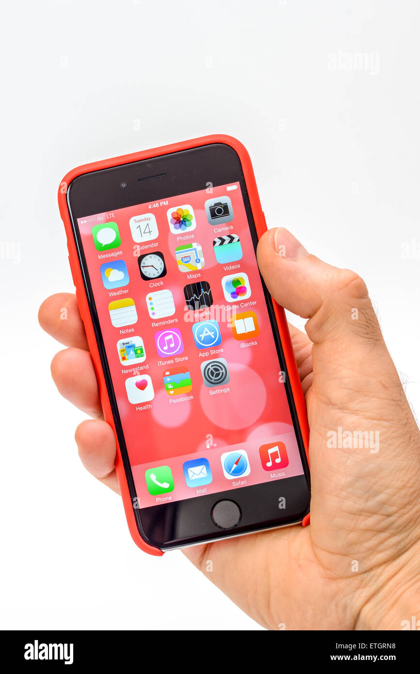 Apple iPhone 6 mobile / cell phone in red case Stock Photo