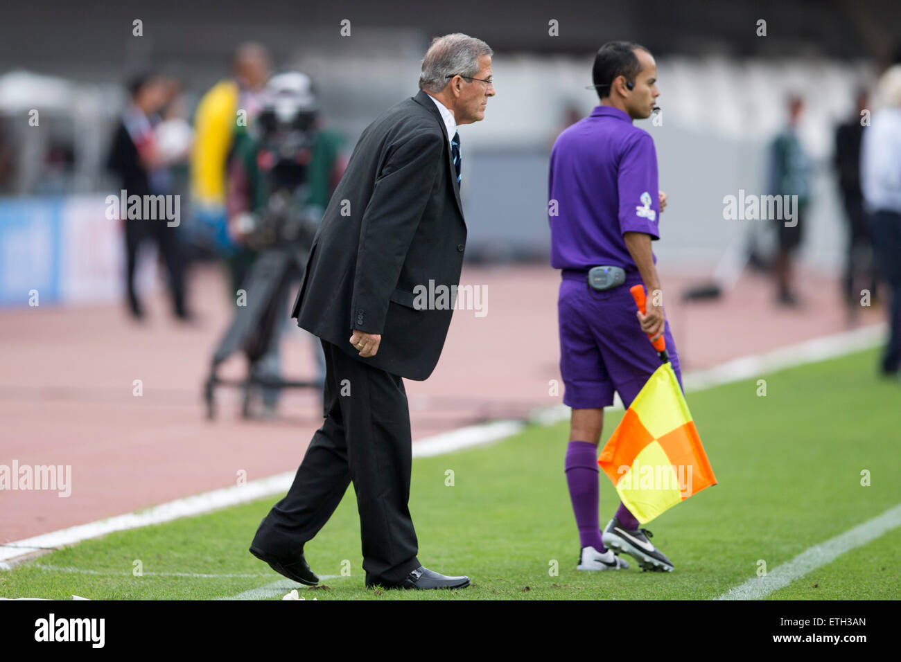 Antofagasta, Chile. 13th June, 2015. Oscar Tabarez (L), head coach of Uruguay, reacts during a Group B match between Uruguay and Jamaica at Copa America 2015, in Antofagasta, Chile, on June 13, 2015. Uruguay won 1-0. © Luis Echeverria/Xinhua/Alamy Live News Stock Photo