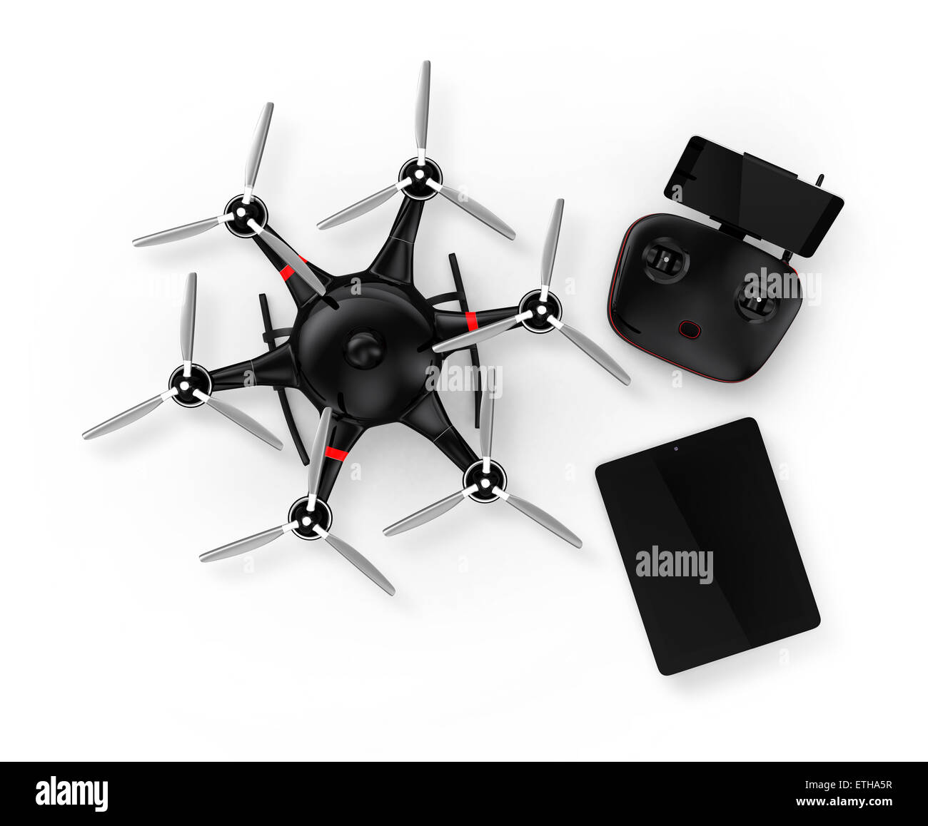Top view of black hexacopter with remote controller and tablet PC. Stock Photo