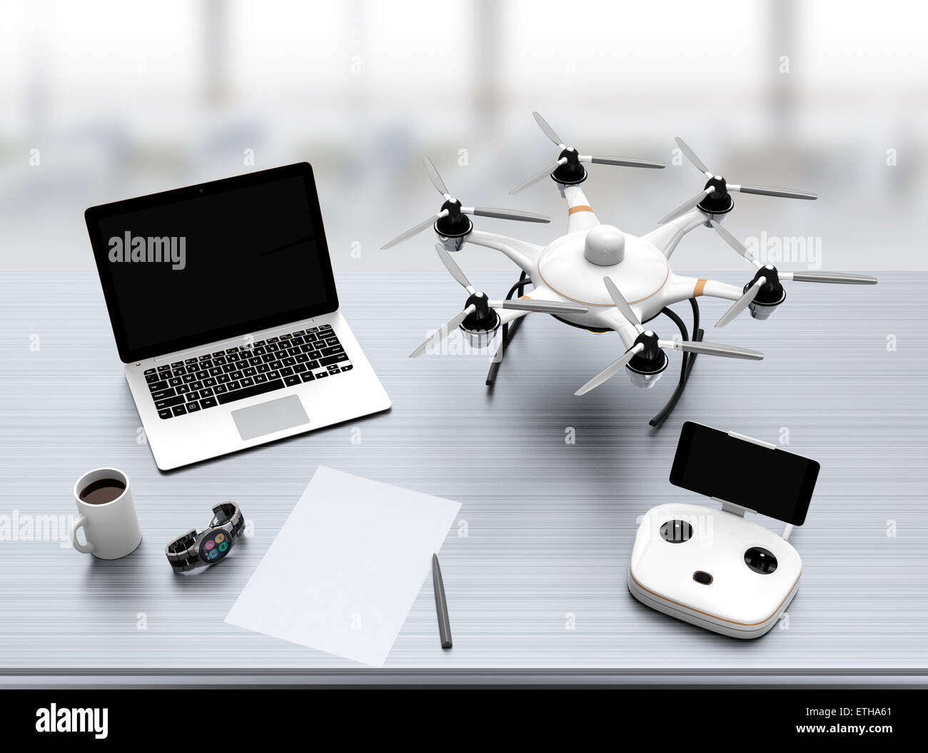 Hexacopter remote controller laptop on desk with office interior background Stock Photo