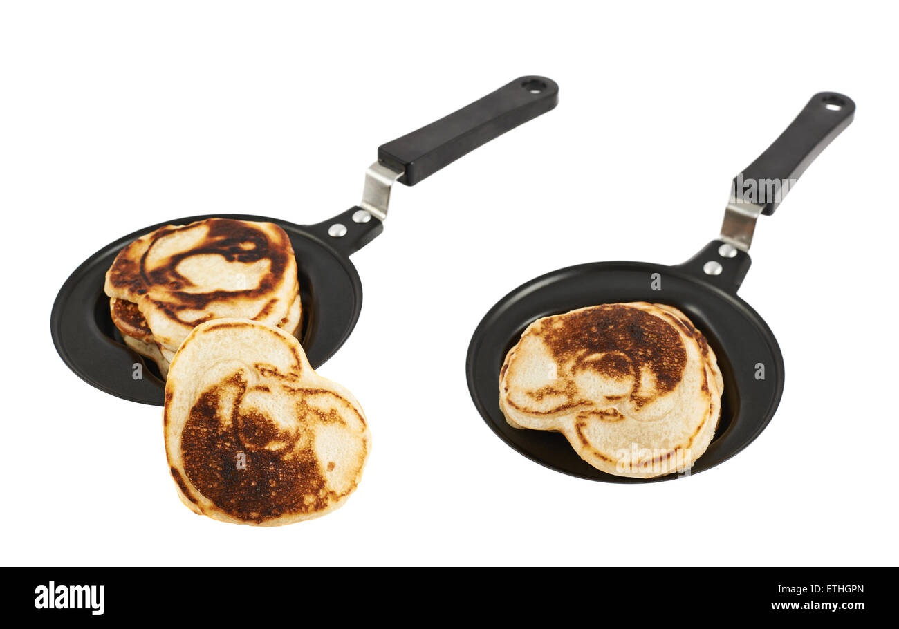 Heart shaped flapjack pancake in a pan Stock Photo Alamy