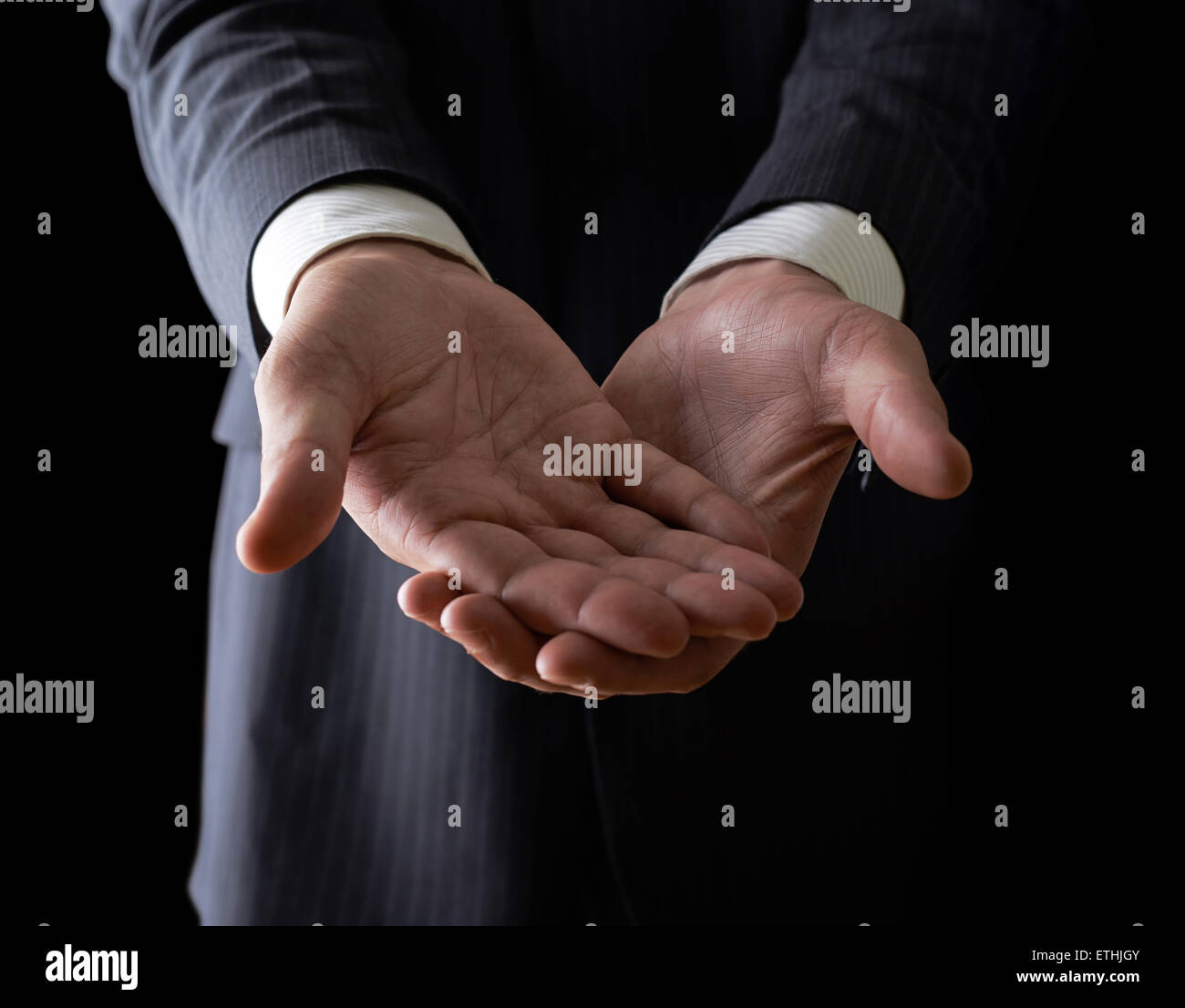 Two reaching out hands close-up composition Stock Photo