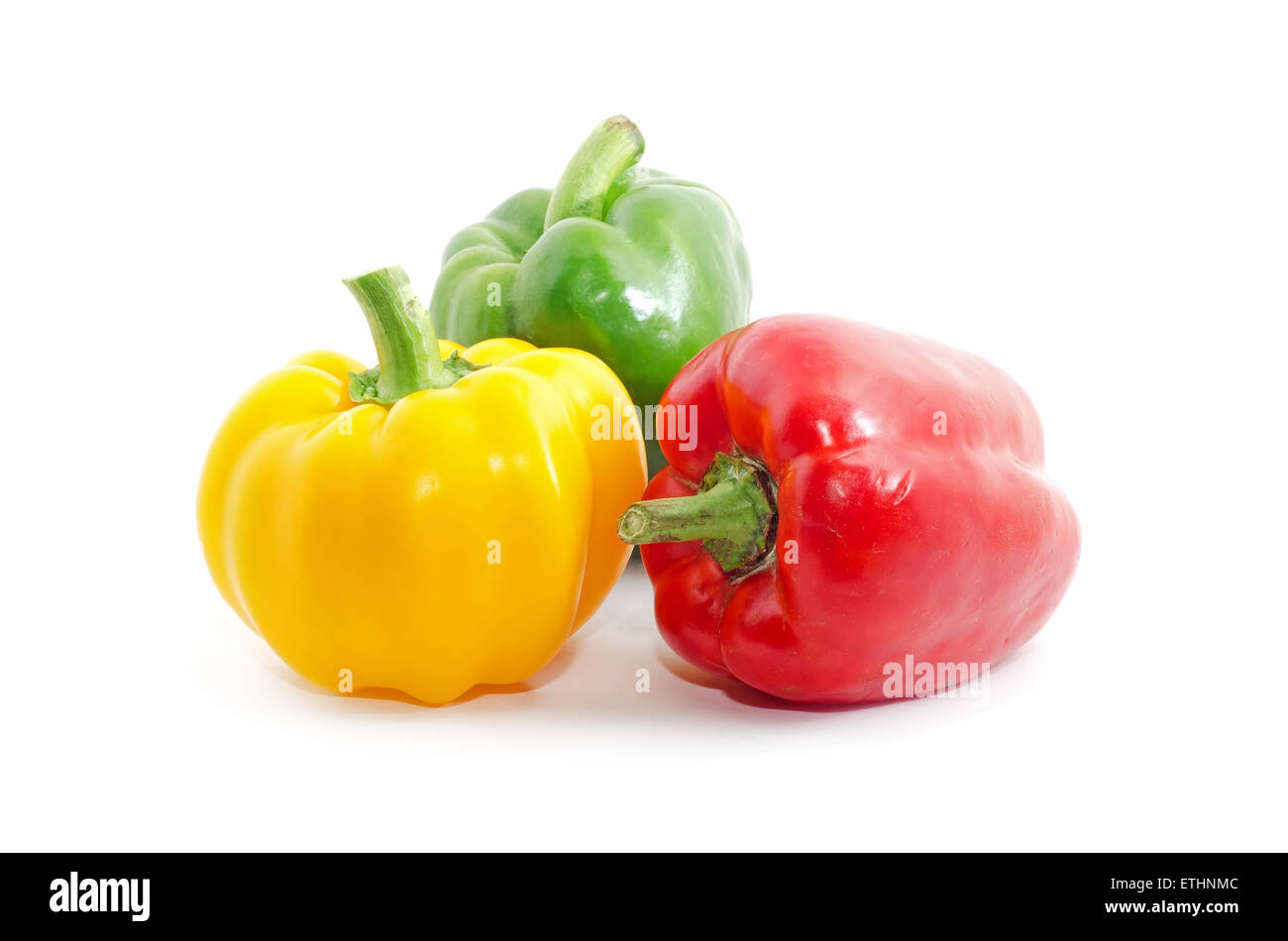 fresh yellow, red bell peppers on white background Stock Photo - Alamy