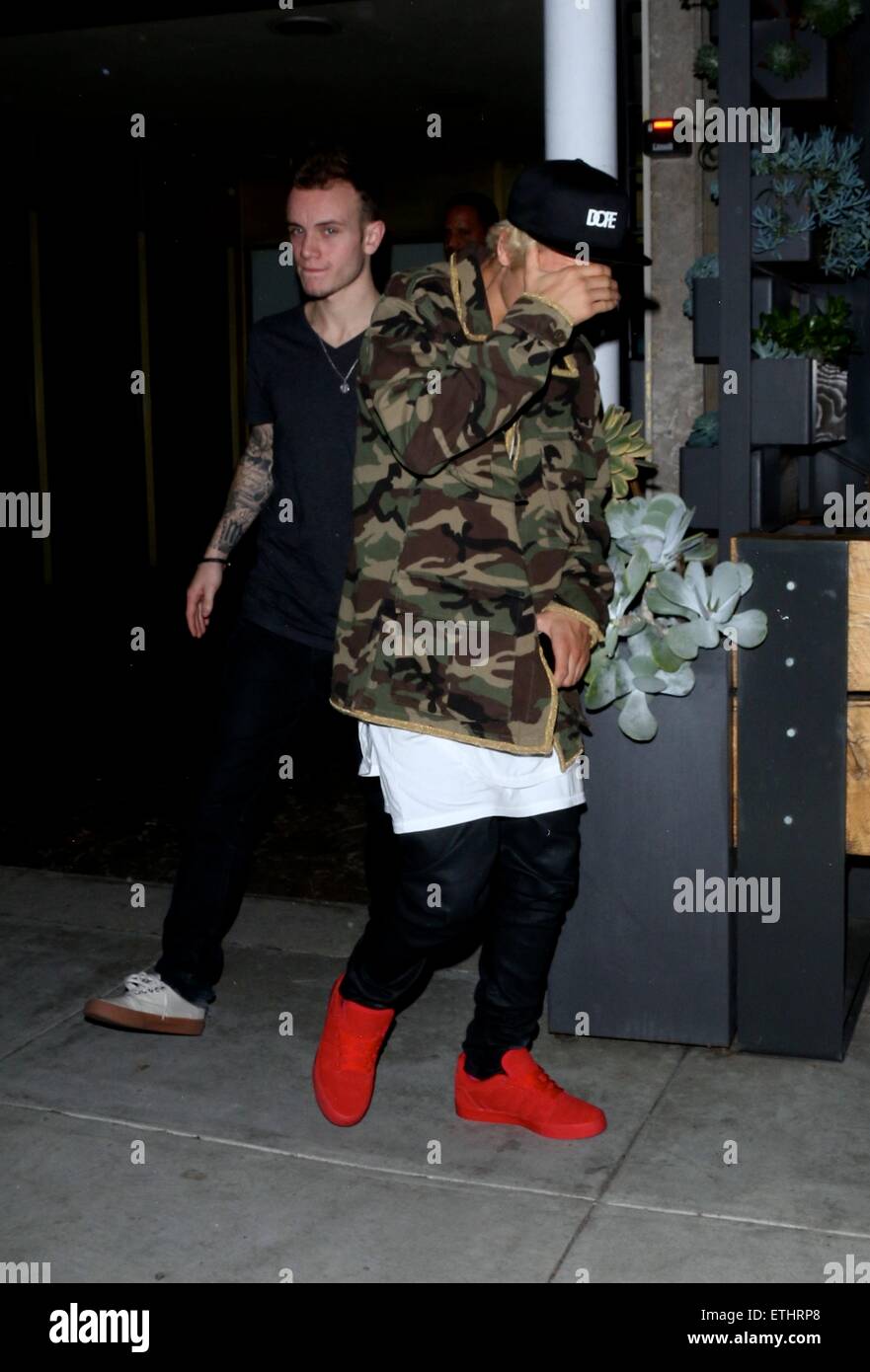 Justin Bieber wears a white jacket and matching baseball cap while out and  about in Beverly Hills Beverly Hills California Stock Photo - Alamy