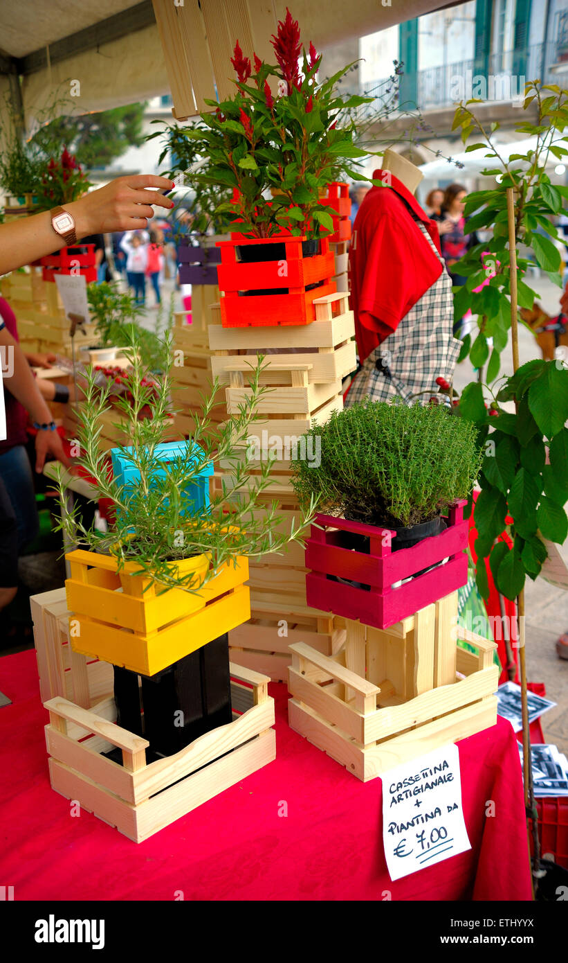 lot of colored wooden boxes for sale at the market Stock Photo - Alamy