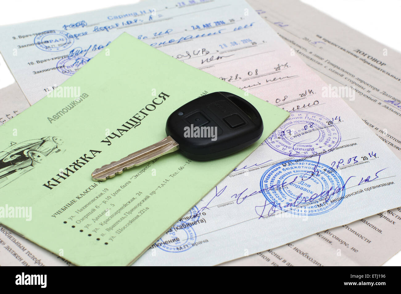 book learner driver courses, lies on the medical certificate and agreement on training in a driving school Russia Stock Photo