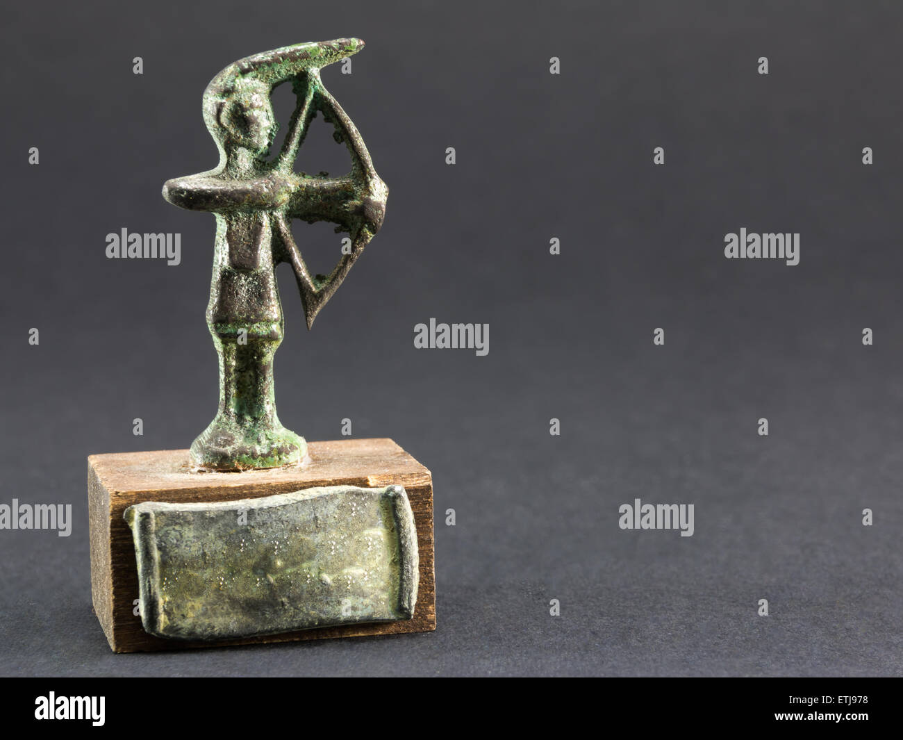 archer bronze figurine, arrow and bow statuette Stock Photo Alamy
