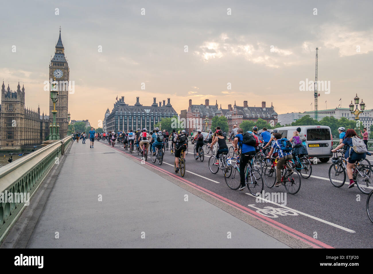 Westminster bridge cyclists Stock Photo