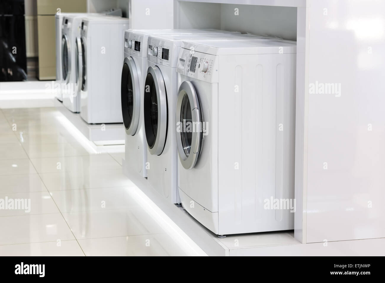 washing machines in appliance store Stock Photo