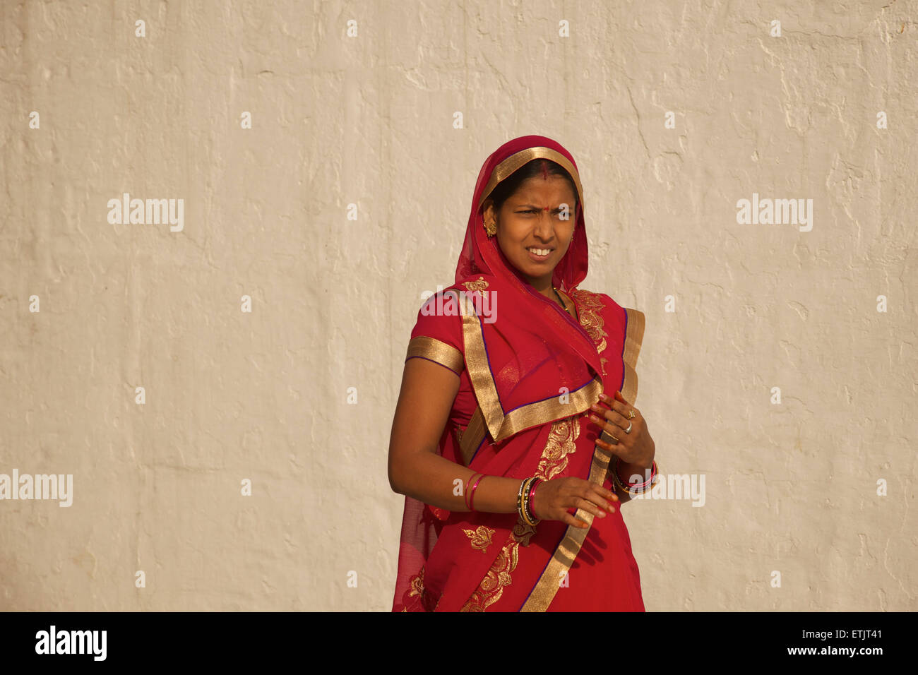 Indian women in red sari. Udaipur, Rajasthan, India Stock Photo