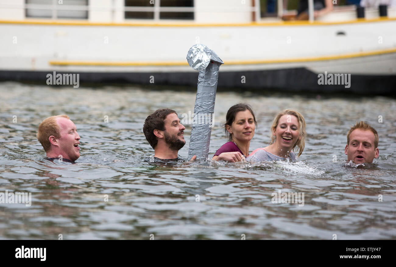 Cambridge, UK. 14th June, 2015. Cambridge University Students Cardboard Boat Race. At least this boat was fitted with the periscope as it went down. Credit:  Action Plus Sports/Alamy Live News Stock Photo