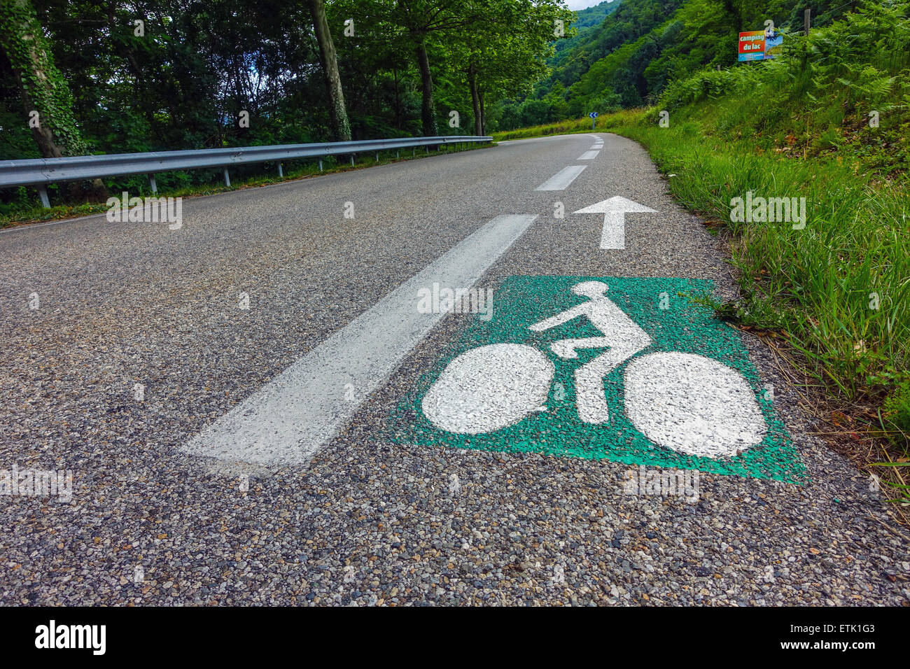 Green and white sign painted on road on cycleway, cycle way cycle-lane, cycle lane France Stock Photo